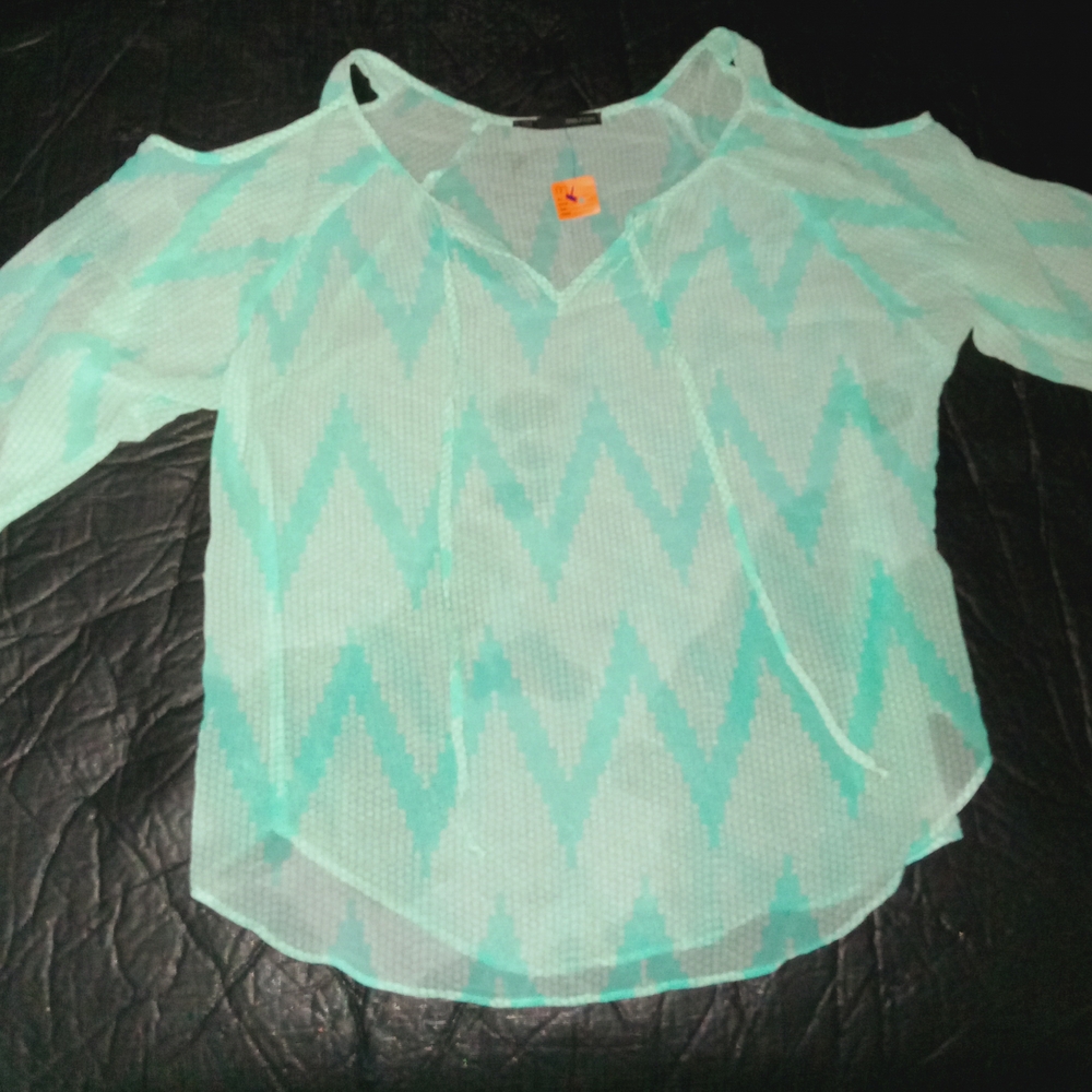 Maurices Aqua Green Asymmetrical Cut Out Blouse 3/4 Sleeve Geo Pattern